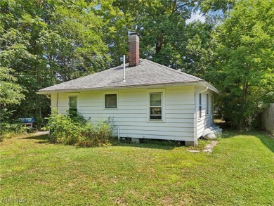The address is 105 Hartzell Rd. It used to be Cottage #51 on Sebring Country Club in Ohio - for sale on GolfHomes.com, golf home, golf lot