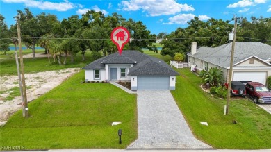 GOLF COURSE HOME on the 11th fairway of Coral Oaks Golf Course on Burnt Store Golf Club in Florida - for sale on GolfHomes.com, golf home, golf lot