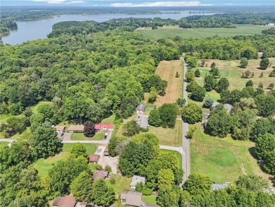 The address is 105 Hartzell Rd. It used to be Cottage #51 on Sebring Country Club in Ohio - for sale on GolfHomes.com, golf home, golf lot