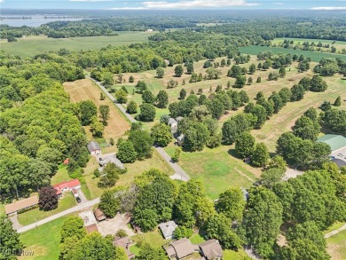The address is 105 Hartzell Rd. It used to be Cottage #51 on Sebring Country Club in Ohio - for sale on GolfHomes.com, golf home, golf lot