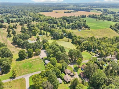 The address is 105 Hartzell Rd. It used to be Cottage #51 on Sebring Country Club in Ohio - for sale on GolfHomes.com, golf home, golf lot