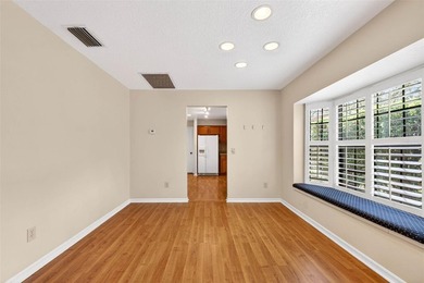 Located in the highly sought-after, guard-gated Hunter's Green on Hunters Green Country Club in Florida - for sale on GolfHomes.com, golf home, golf lot