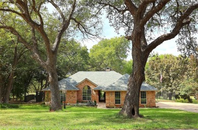 Welcome home to your peaceful double lot RIVERFRONT home in on Pecan Plantation Country Club in Texas - for sale on GolfHomes.com, golf home, golf lot