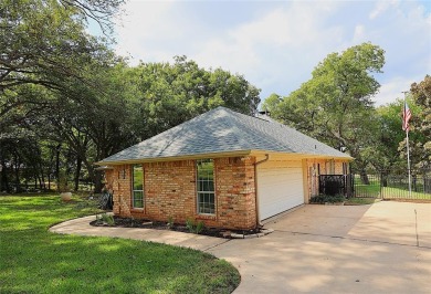 Welcome home to your peaceful double lot RIVERFRONT home in on Pecan Plantation Country Club in Texas - for sale on GolfHomes.com, golf home, golf lot
