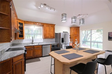 Welcome home to your peaceful double lot RIVERFRONT home in on Pecan Plantation Country Club in Texas - for sale on GolfHomes.com, golf home, golf lot