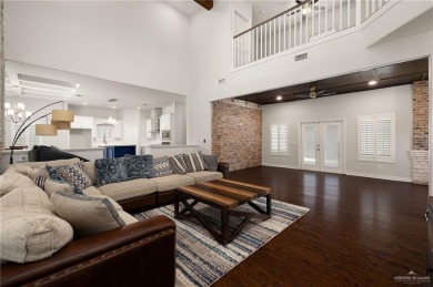 Welcome to this beautiful two-story brick home, ideally situated on Los Lagos Golf Club in Texas - for sale on GolfHomes.com, golf home, golf lot