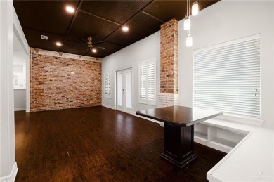 Welcome to this beautiful two-story brick home, ideally situated on Los Lagos Golf Club in Texas - for sale on GolfHomes.com, golf home, golf lot