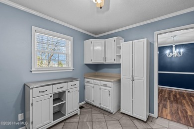 Welcome home to this beautifully updated single-level residence on Woodlake Country Club in North Carolina - for sale on GolfHomes.com, golf home, golf lot