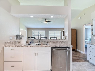 LIGHT, BRIGHT AND OPEN!! This spacious two bedroom + flex space on Tampa Bay Golf and Country Club in Florida - for sale on GolfHomes.com, golf home, golf lot