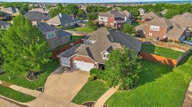 Location, lifestyle, and lake days! This beautifully located on Mansfield National Golf Club in Texas - for sale on GolfHomes.com, golf home, golf lot