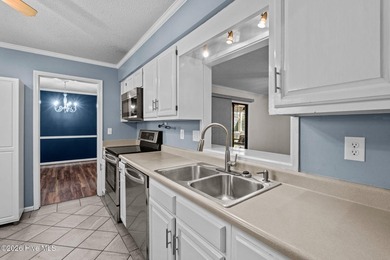 Welcome home to this beautifully updated single-level residence on Woodlake Country Club in North Carolina - for sale on GolfHomes.com, golf home, golf lot