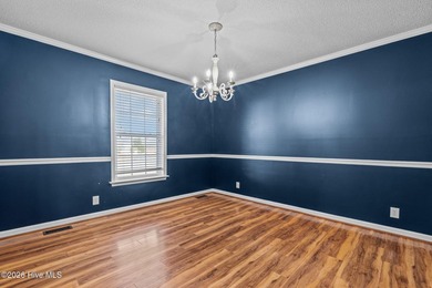 Welcome home to this beautifully updated single-level residence on Woodlake Country Club in North Carolina - for sale on GolfHomes.com, golf home, golf lot