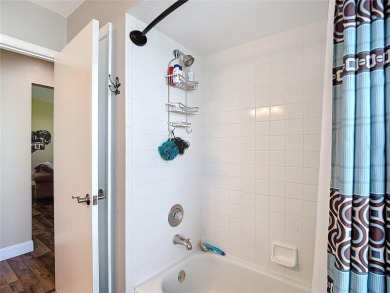 LIGHT, BRIGHT AND OPEN!! This spacious two bedroom + flex space on Tampa Bay Golf and Country Club in Florida - for sale on GolfHomes.com, golf home, golf lot