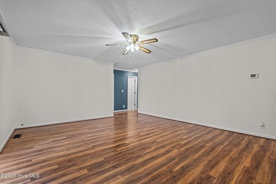 Welcome home to this beautifully updated single-level residence on Woodlake Country Club in North Carolina - for sale on GolfHomes.com, golf home, golf lot