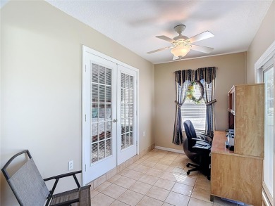 LIGHT, BRIGHT AND OPEN!! This spacious two bedroom + flex space on Tampa Bay Golf and Country Club in Florida - for sale on GolfHomes.com, golf home, golf lot