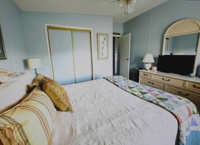 Beautiful 2-Bedroom Palm Harbor Home with Stunning Golf Course on Schalamar Creek Golf and Country Club in Florida - for sale on GolfHomes.com, golf home, golf lot