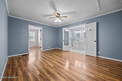 Welcome home to this beautifully updated single-level residence on Woodlake Country Club in North Carolina - for sale on GolfHomes.com, golf home, golf lot