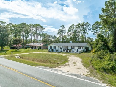 Enjoy gorgeous water views from the private front courtyard of on St. James Bay in Florida - for sale on GolfHomes.com, golf home, golf lot