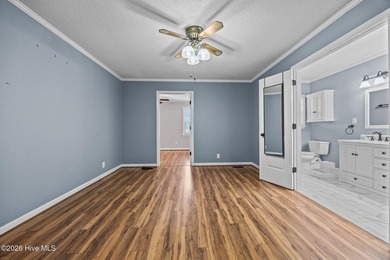 Welcome home to this beautifully updated single-level residence on Woodlake Country Club in North Carolina - for sale on GolfHomes.com, golf home, golf lot