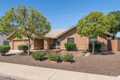 Welcome to this beautifully refreshed 4-bedroom, 2-bathroom home on Adobe Dam Family Golf Center in Arizona - for sale on GolfHomes.com, golf home, golf lot