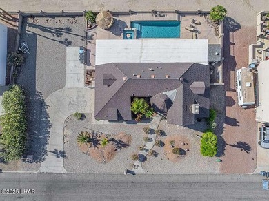 On the fairway! Welcome home to this iconic Havasu property in on London Bridge Golf Course in Arizona - for sale on GolfHomes.com, golf home, golf lot