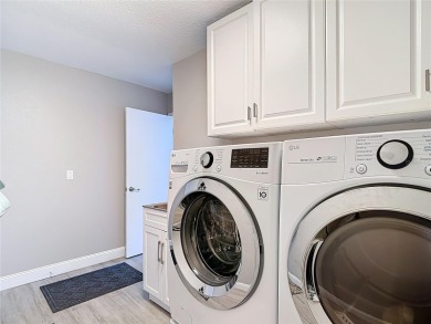LIGHT, BRIGHT AND OPEN!! This spacious two bedroom + flex space on Tampa Bay Golf and Country Club in Florida - for sale on GolfHomes.com, golf home, golf lot