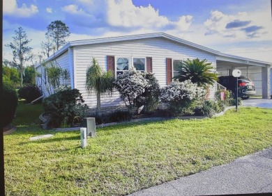 Beautiful 2-Bedroom Palm Harbor Home with Stunning Golf Course on Schalamar Creek Golf and Country Club in Florida - for sale on GolfHomes.com, golf home, golf lot