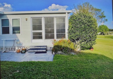 Beautiful 2-Bedroom Palm Harbor Home with Stunning Golf Course on Schalamar Creek Golf and Country Club in Florida - for sale on GolfHomes.com, golf home, golf lot