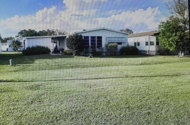 Beautiful 2-Bedroom Palm Harbor Home with Stunning Golf Course on Schalamar Creek Golf and Country Club in Florida - for sale on GolfHomes.com, golf home, golf lot