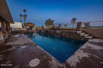 On the fairway! Welcome home to this iconic Havasu property in on London Bridge Golf Course in Arizona - for sale on GolfHomes.com, golf home, golf lot