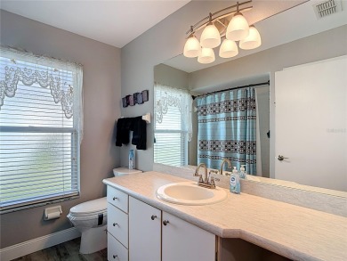 LIGHT, BRIGHT AND OPEN!! This spacious two bedroom + flex space on Tampa Bay Golf and Country Club in Florida - for sale on GolfHomes.com, golf home, golf lot