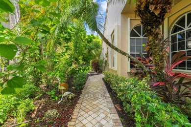 Discover your dream retreat nestled in the prestigious Cambridge on Wycliffe Golf and Country Club in Florida - for sale on GolfHomes.com, golf home, golf lot