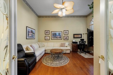 Discover your dream retreat nestled in the prestigious Cambridge on Wycliffe Golf and Country Club in Florida - for sale on GolfHomes.com, golf home, golf lot