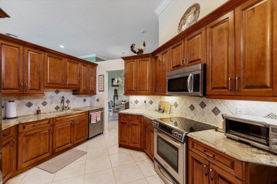 Discover your dream retreat nestled in the prestigious Cambridge on Wycliffe Golf and Country Club in Florida - for sale on GolfHomes.com, golf home, golf lot