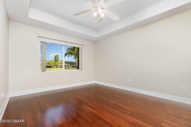 This end-unit villa condominium offers scenic golf course views on Spruce Creek Golf Club in Florida - for sale on GolfHomes.com, golf home, golf lot
