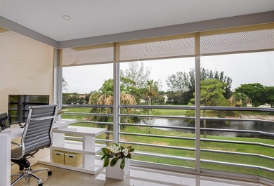 WELCOME TO THIS BEAUTIFUL UPGRADED TOP FLOOR CONDO WITH ITS OPEN on Poinciana Golf Club in Florida - for sale on GolfHomes.com, golf home, golf lot