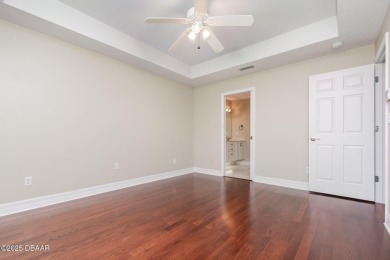 This end-unit villa condominium offers scenic golf course views on Spruce Creek Golf Club in Florida - for sale on GolfHomes.com, golf home, golf lot