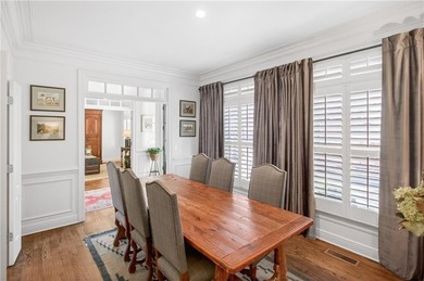 Tucked beneath a canopy of mature hardwoods and overlooking the on Moores Mill Golf Club in Alabama - for sale on GolfHomes.com, golf home, golf lot