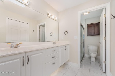 This end-unit villa condominium offers scenic golf course views on Spruce Creek Golf Club in Florida - for sale on GolfHomes.com, golf home, golf lot