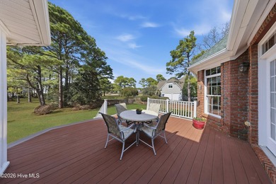 Love to entertain while enjoying stunning views of the pond and on Members Club At St. James Plantation in North Carolina - for sale on GolfHomes.com, golf home, golf lot