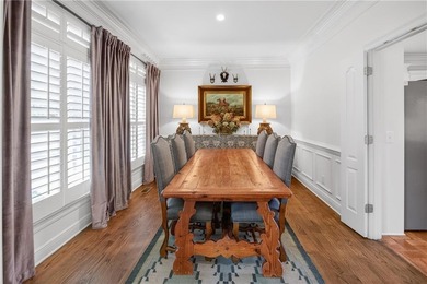 Tucked beneath a canopy of mature hardwoods and overlooking the on Moores Mill Golf Club in Alabama - for sale on GolfHomes.com, golf home, golf lot