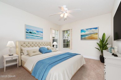 This end-unit villa condominium offers scenic golf course views on Spruce Creek Golf Club in Florida - for sale on GolfHomes.com, golf home, golf lot