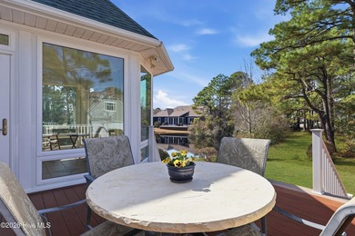 Love to entertain while enjoying stunning views of the pond and on Members Club At St. James Plantation in North Carolina - for sale on GolfHomes.com, golf home, golf lot