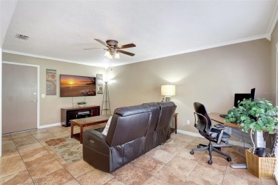 Welcome to this lovingly maintained 4-bedroom, 2.5-bath home on Hunters Green Country Club in Florida - for sale on GolfHomes.com, golf home, golf lot