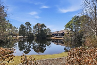 Love to entertain while enjoying stunning views of the pond and on Members Club At St. James Plantation in North Carolina - for sale on GolfHomes.com, golf home, golf lot