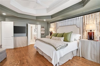 Tucked beneath a canopy of mature hardwoods and overlooking the on Moores Mill Golf Club in Alabama - for sale on GolfHomes.com, golf home, golf lot