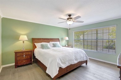 Welcome to this lovingly maintained 4-bedroom, 2.5-bath home on Hunters Green Country Club in Florida - for sale on GolfHomes.com, golf home, golf lot