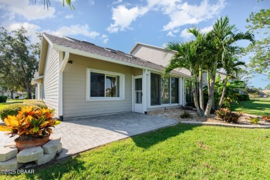 This end-unit villa condominium offers scenic golf course views on Spruce Creek Golf Club in Florida - for sale on GolfHomes.com, golf home, golf lot