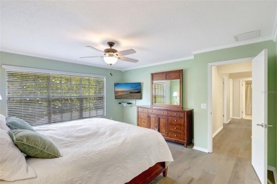 Welcome to this lovingly maintained 4-bedroom, 2.5-bath home on Hunters Green Country Club in Florida - for sale on GolfHomes.com, golf home, golf lot