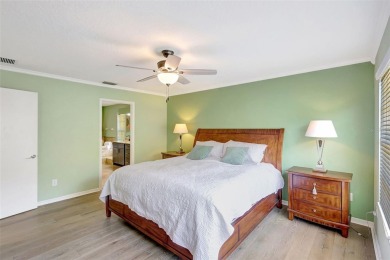 Welcome to this lovingly maintained 4-bedroom, 2.5-bath home on Hunters Green Country Club in Florida - for sale on GolfHomes.com, golf home, golf lot